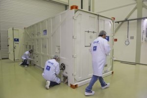 Technicians opening the Galileo Container