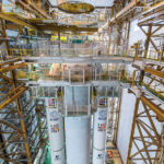 Ariane 5’s vehicle equipment bay is lowered for installation