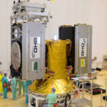 Two of the four Galileo satellites are shown being installed on their dispenser system.