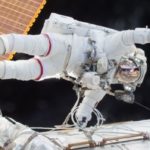 Mr Kelly is pictured on a space walk outside the International Space Station